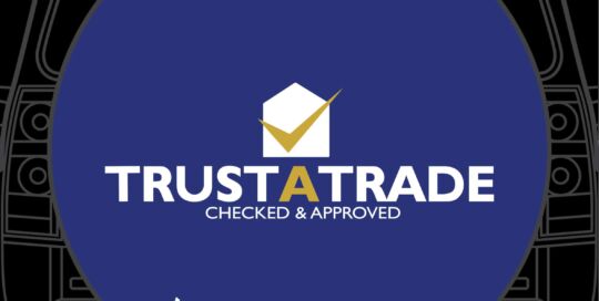 Trust A Trade logo on custom tire cover with checkmark and website.