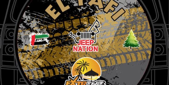 El Yafi Jeep Nation badge on custom tire cover with tire tracks background.