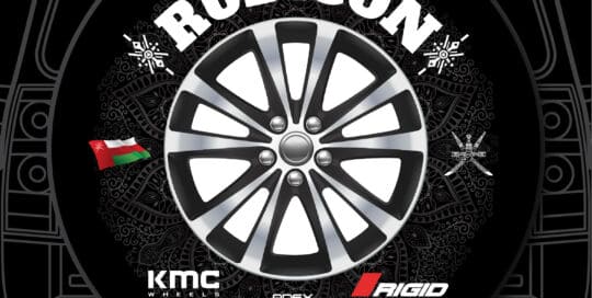Rubicon KMC wheel custom tire cover with logo and design elements.