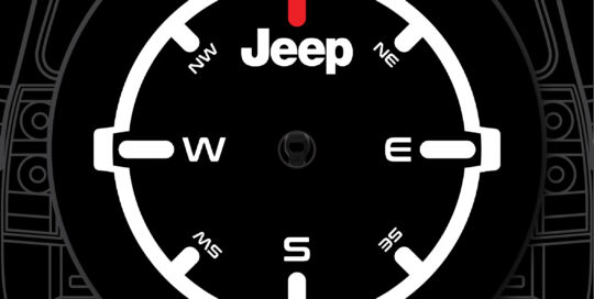 Jeep compass with custom tire cover featuring a compass design.