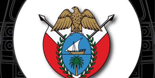 Dubai emblem with eagle, boat, palm tree, and shield on a custom tire cover.