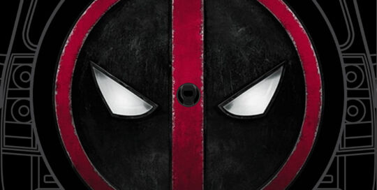 Deadpool mask badge on custom tire cover with black and red design.