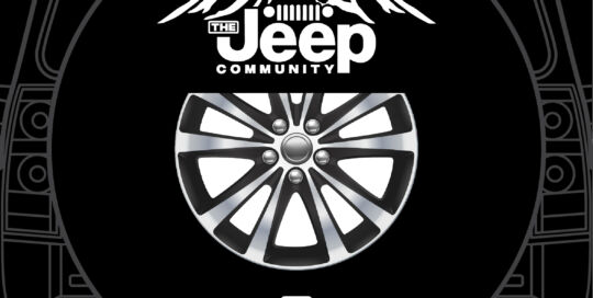 Jeep community logo on custom tire cover with mountain design.
