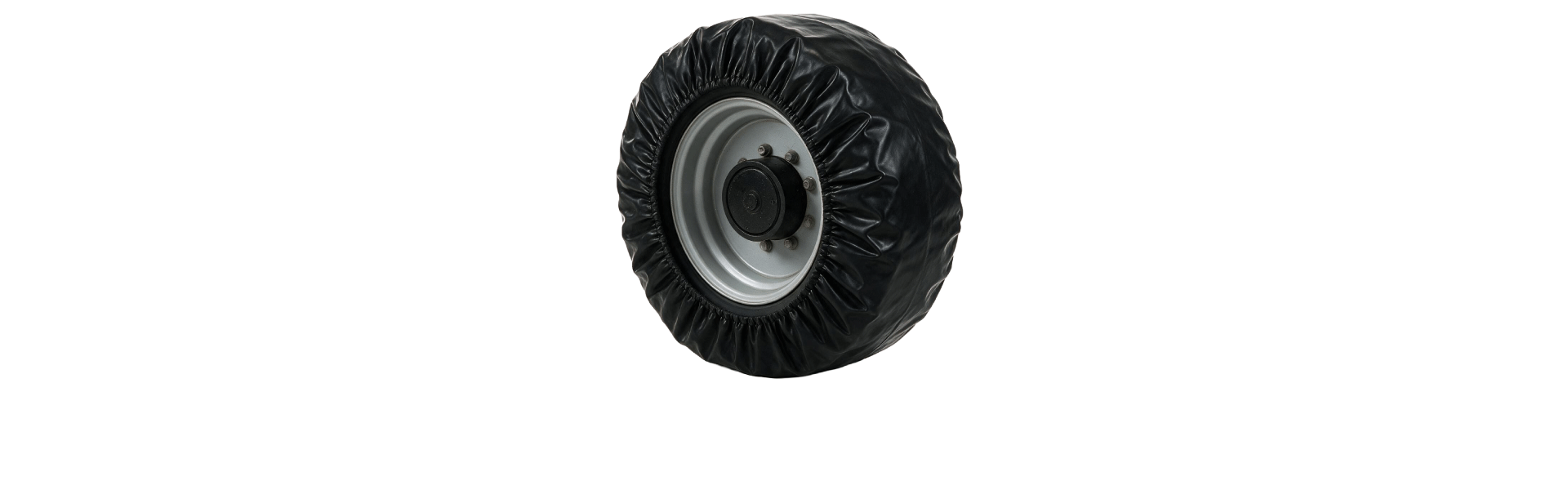 Black fabric tire bootie cover fitted over an industrial equipment wheel with visible wheel hub and bolts, non-marking cover for boom lifts and scissor lifts