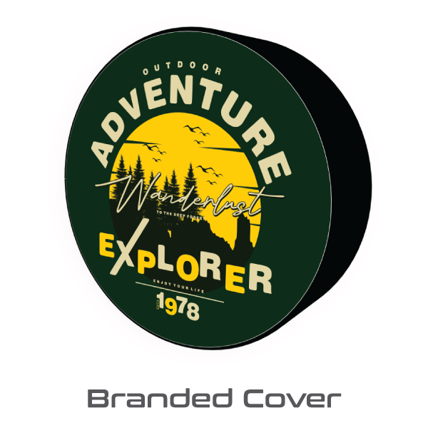 Red Jeep Wrangler rear tire fitted with a green-branded custom tire cover featuring a mountain sunset and forest design